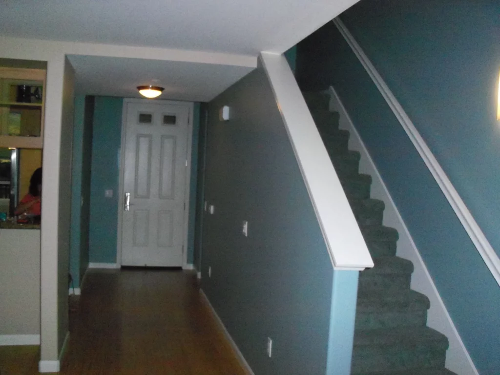 painted blue hallway and stairwell