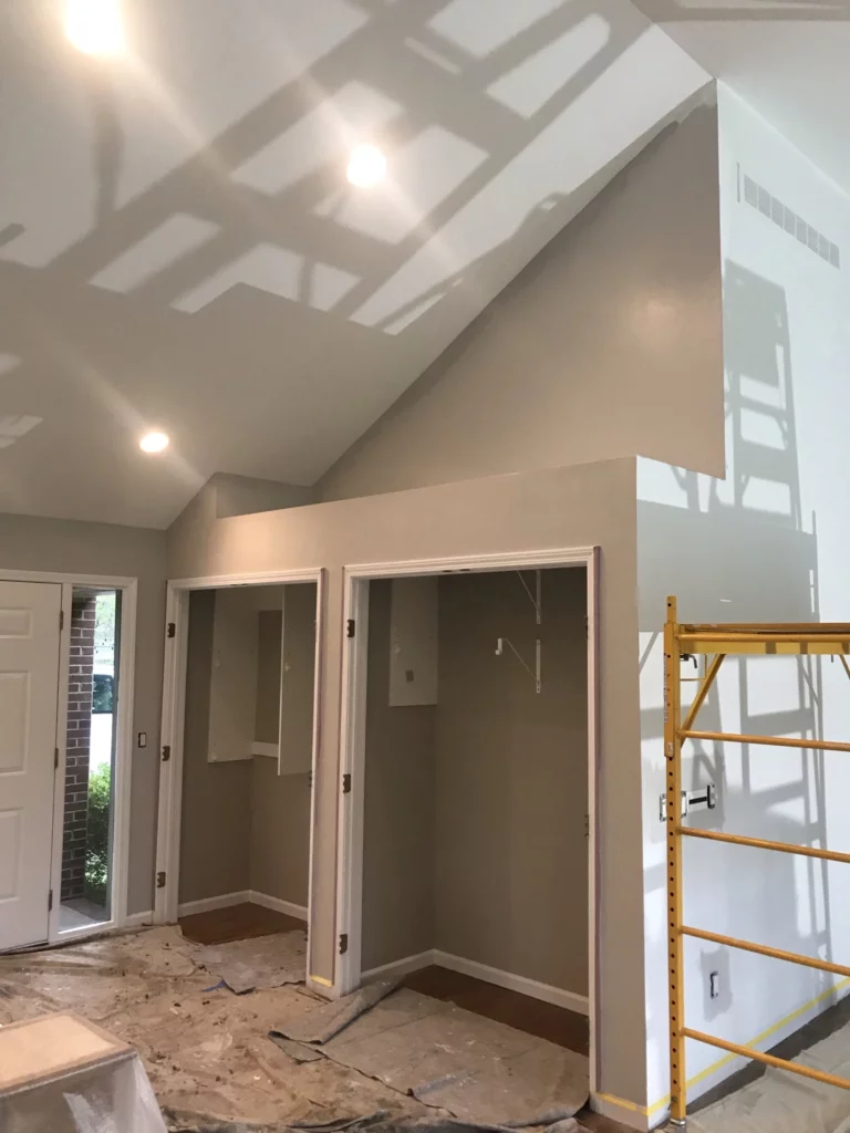 vaulted ceiling, closets, front door painted with attention to detail and precision